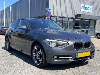 schade BMW 1-serie 116i Business AUTOMAAT