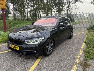 skadebil auto BMW 1-serie 120i High Executive M 2017/7