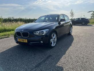 Schadeauto BMW 1-serie 114i EDE High Executive 2014/5
