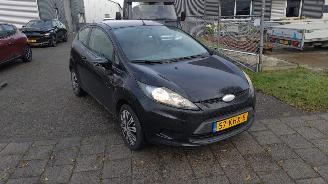 Schadeauto Ford Fiesta 1.25 limited  benzine airco 2009/1