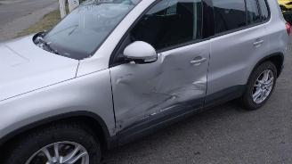 Volkswagen Tiguan 1.4TSI Comfort en Design 4 Motion lichte schade picture 4