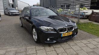Schadeauto BMW 5-serie Touring 520i High Executive M-sport Leer Pano supermooie auto 2015/1