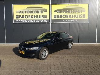 damaged passenger cars BMW 3-serie 320i Executive 2012/5