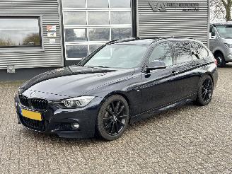 damaged passenger cars BMW 3-serie 330i Touring M-Sport Automaat 2018/10
