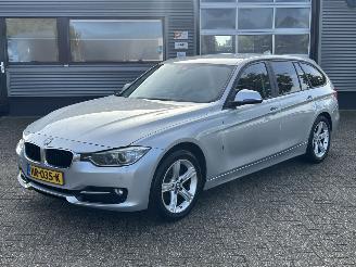 Schadeauto BMW 3-serie 318D Touring High Executive Automaat 2015/4