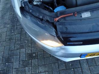 Volkswagen Polo 1.2 TDI BlueMotion Comfortline airco parkeer schade kan rijdend mee picture 9