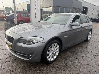 damaged passenger cars BMW 5-serie Touring 520d High Executive 2011/12