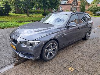 Damaged car BMW 3-serie 320i touring sport automaat 2015/9