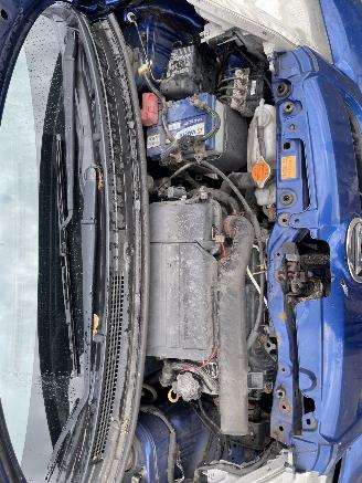 Daihatsu Cuore 1.0-12V DVVT picture 6