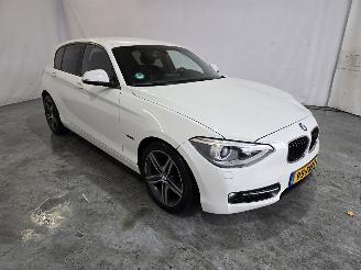 skadebil auto BMW 1-serie 116i Business+ 2012/6