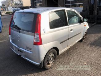 Daihatsu Cuore Cuore (L251/271/276), Hatchback, 2003 1.0 12V DVVT picture 3