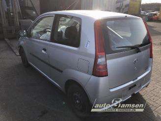 Daihatsu Cuore Cuore (L251/271/276), Hatchback, 2003 1.0 12V DVVT picture 4