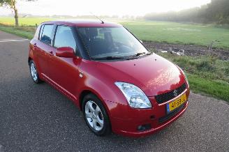 Suzuki Swift 1.5 102pk Exclusief 128.000km  van oma Geweest  Airco picture 1