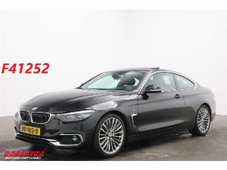 Unfallwagen BMW 4-serie Coupé 440i M-Sport Schuifdak LED Leder H/K Memory HUD Camera AHK 2017/12