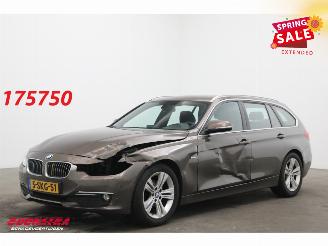 Schadeauto BMW 3-serie Touring 320d EDE Luxury Navi Clima Cruise PDC 2013/10