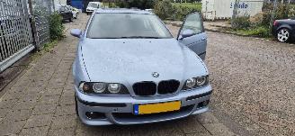 uszkodzony samochody osobowe BMW 5-serie M5 met V8 1999/2