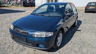Sloopauto Mazda 323 1.4 1997/11