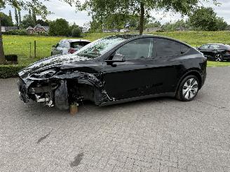 Schadeauto Tesla Model Y DUAL MOTOR LONG RANGE AUTO 4WD 2024/3