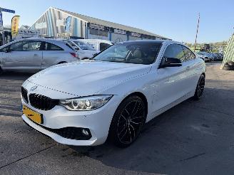 Damaged car BMW 4-serie 420I 135KW Autom. Clima Navi Leer High Executive NAP 2014/2
