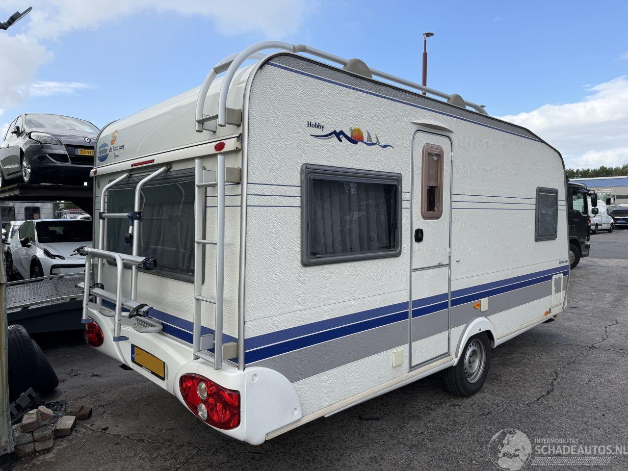 Hobby  30 Vastbed Middenkeuken Rondzit