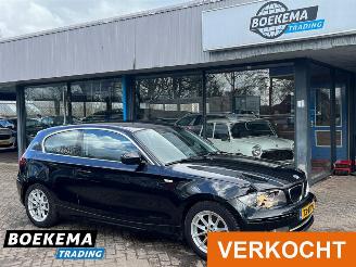 skadebil auto BMW 1-serie 116i Business Line Navigatie Cruise Climate 2010/2