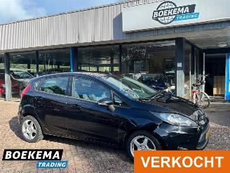 damaged passenger cars Ford Fiesta 1.25 Champion Airco 5-deurs Trekhaak Elektrische Ramen 2012/4