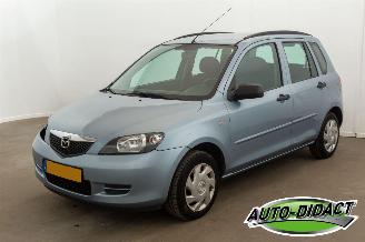 Vaurioauto  passenger cars Mazda 2 1.4 Automatic 95.574 KM Nap  Airco 2004/5