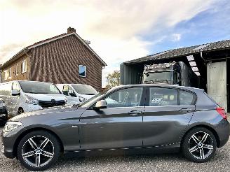 Coche accidentado BMW 1-serie 118i 136pk 6-bak Cent Sport-Line 2017/2