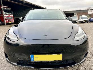 Tesla Model Y long range 75kwh aut - pano - leer - carbon - 360cam - stoelverw v+a - multimedia achter picture 3
