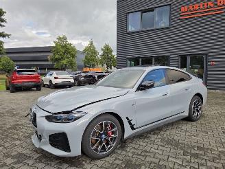 Schadeauto BMW i4 M-50 400KW  X-Drive / PANO / HEAD UPP / BROOKLYN GRAU 2023/10