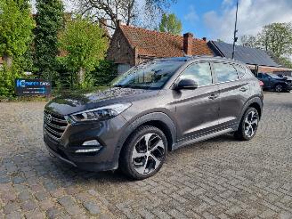 Schadeauto Hyundai Tucson 1.6 T-GDI AWD Aut. Pano Navi Led Stoelverw 2016/4