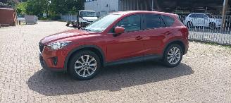 Mazda CX-5 4x4 Navigatie Bose Soundsystem Xenon Leren Sportstoelen-Memory Climatecontrol CruiseControl Stoelverwarming Lichtautomaat Privacyglas keyless Entry trekhaak Parkeersensoren Achteruitrijcamera 2014/7