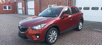 krockskadad bil auto Mazda CX-5 4WD Diesel Navigatie Xenon Leder Bose-sound Climatecontrol CruiseControl Stoelverwarming Lichtautomaat Privacyglas keyless Entry trekhaak Parkeersensoren Achteruitrijcamera 2014/7