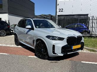 Schadeauto BMW X5 xDrive50e HUD - SKYLOUNGE - IONIC GLOW - BOWERS&WILKINS 2024/1