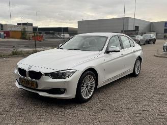 damaged passenger cars BMW 3-serie 320D High Executive Harman Kardon 2014/6
