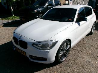 Schadeauto BMW 1-serie 118 I BUSINEES+ CLIMA NAVI 2012/5