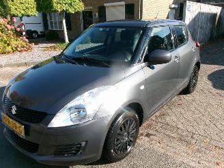 uszkodzony samochody osobowe Suzuki Swift 1.2 COMFORT 4X4 AIRCO 2012/6