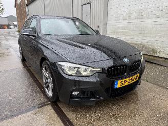 skadebil auto BMW 3-serie Touring 320i M-Sport Automaat 2018/5