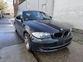 skadebil auto BMW 1-serie 118i Business Line Navigatie 2010/8
