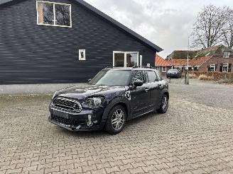 Damaged car Mini Countryman COOPER SPORT HYBRIDE PLUG IN SE 4AWD AUTOMAAT NAVI CLIMA LEER LED PDC STOELVERW B.J 12-2019 2019/12