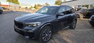 Schadeauto BMW X5 40i M Sport Xdrive*Ambiente*LED*HeadUp*Stoelen Leer/ Memory*ShadowLine*Live Cockpit*AppleCarplay*Parkeer Plus*Sound*Display Key 2019/5