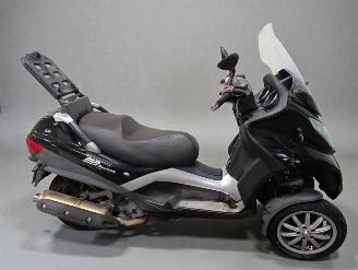 skadebil bromfiets Piaggio  MP3 2011/9