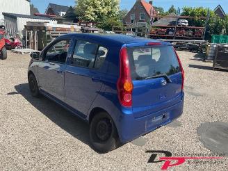 Daihatsu Cuore Cuore (L251/271/276), Hatchback, 2003 1.0 12V DVVT picture 3