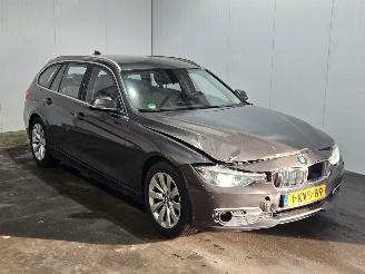 damaged passenger cars BMW 3-serie 316i 1.6 16V Combi/o  Benzine 1.598cc 100kW (136pk) RWD 2013/7