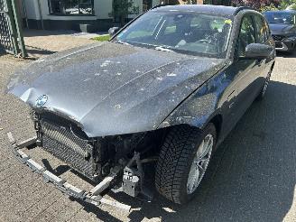 Damaged car BMW 3-serie 320e Touring xDrive Business Automaat 2021/11