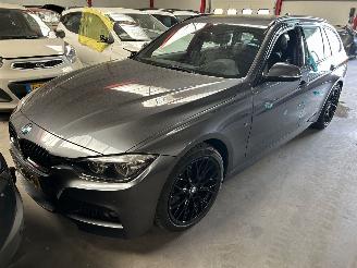 Damaged car BMW 3-serie 320i  Automaat Touring  M Pakket 2019/4